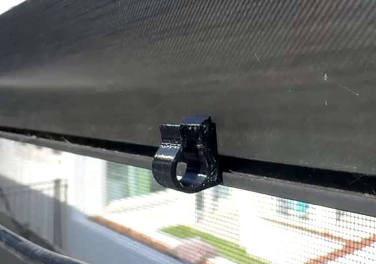 Snap-on clip seated in the pool cage frame channel