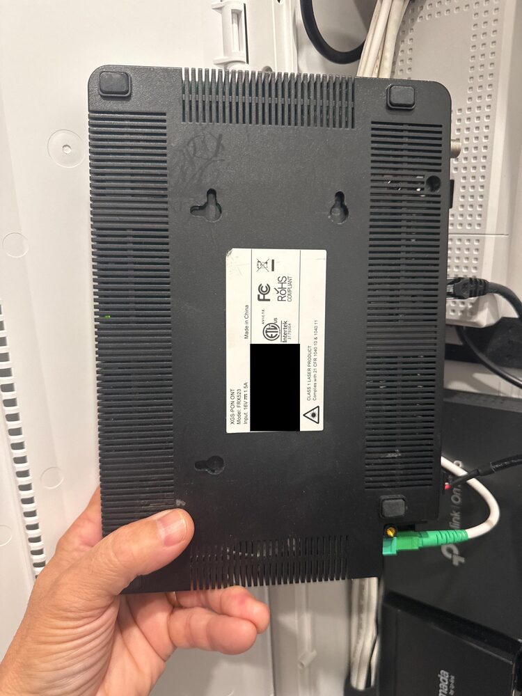 Back of a network device showing its keyhole mounting holes