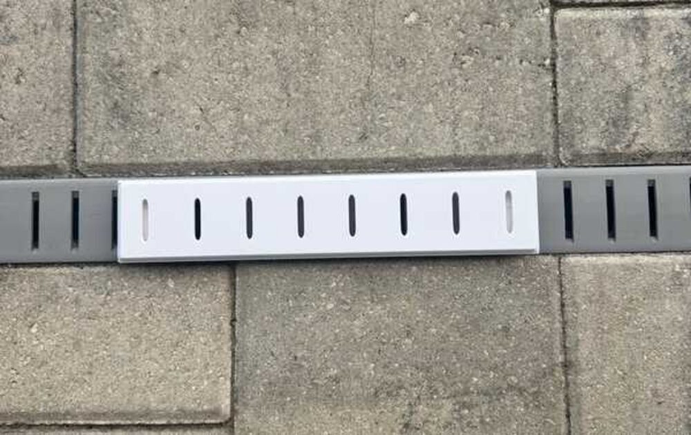 Drain cover seated on top of the channel after install
